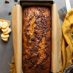 Chocolate chip banana bread in a baking tin.